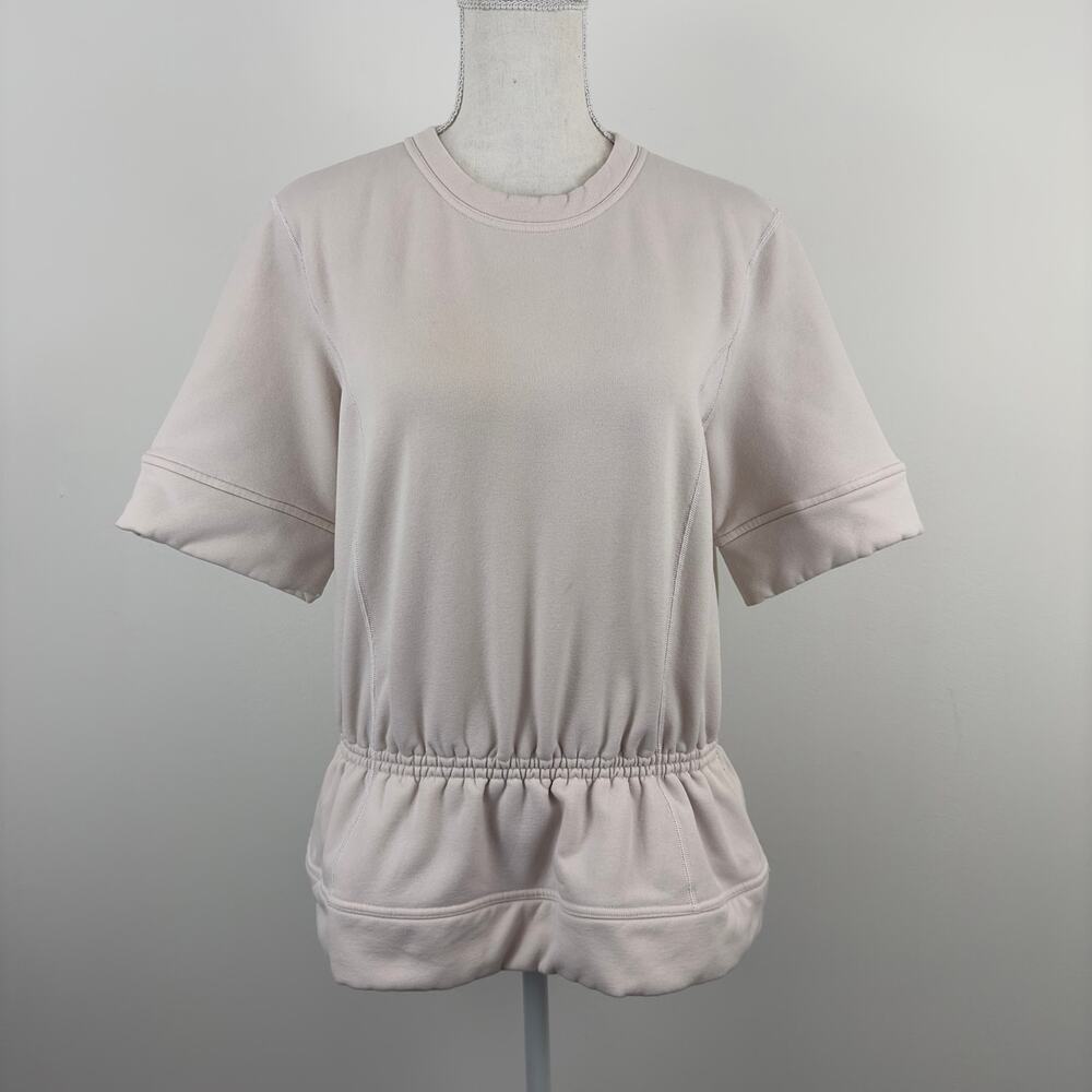 Lululemon peplum top in neutral Blush‎
